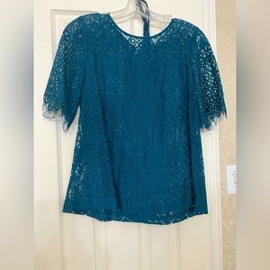 Ann Taylor Loft Lace Top. Has a bow tie in the back and matching camisole.